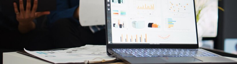 Laptop screen displaying Oracle Netsuite dashboard created with ERP development by RBCH developers.