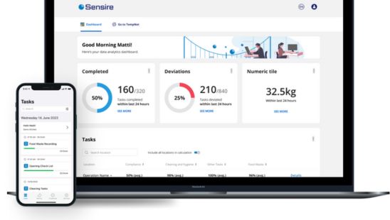 laptop and smartphone displaying computer and mobile version of a telecommunications software