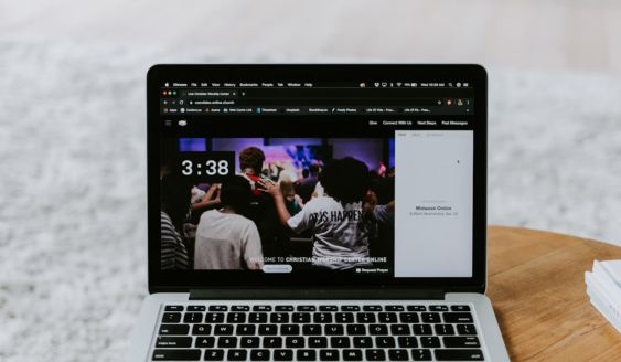 Laptop displaying features of Devops consulting services by RBCH Developers.